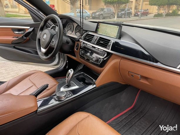 bmw-318i-luxury-2017-big-7