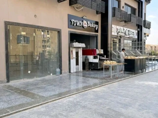 محل متأجر بالفعل لبرانـــد مخبوزات استلام فوري وجاهز للمعا