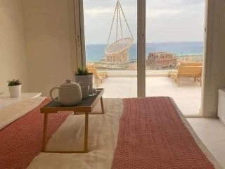 شاليه علي البحر للبيع في قرية the groove العين السخنة