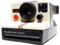 polaroid-sx-70-land-camera-1000-red-button-camera-1977-big-0